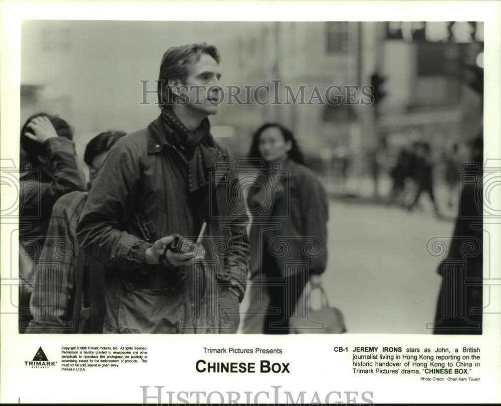 1998 Press Photo Jeremy Irons in a scene from Chinese Box. - sap19844- Historic Images