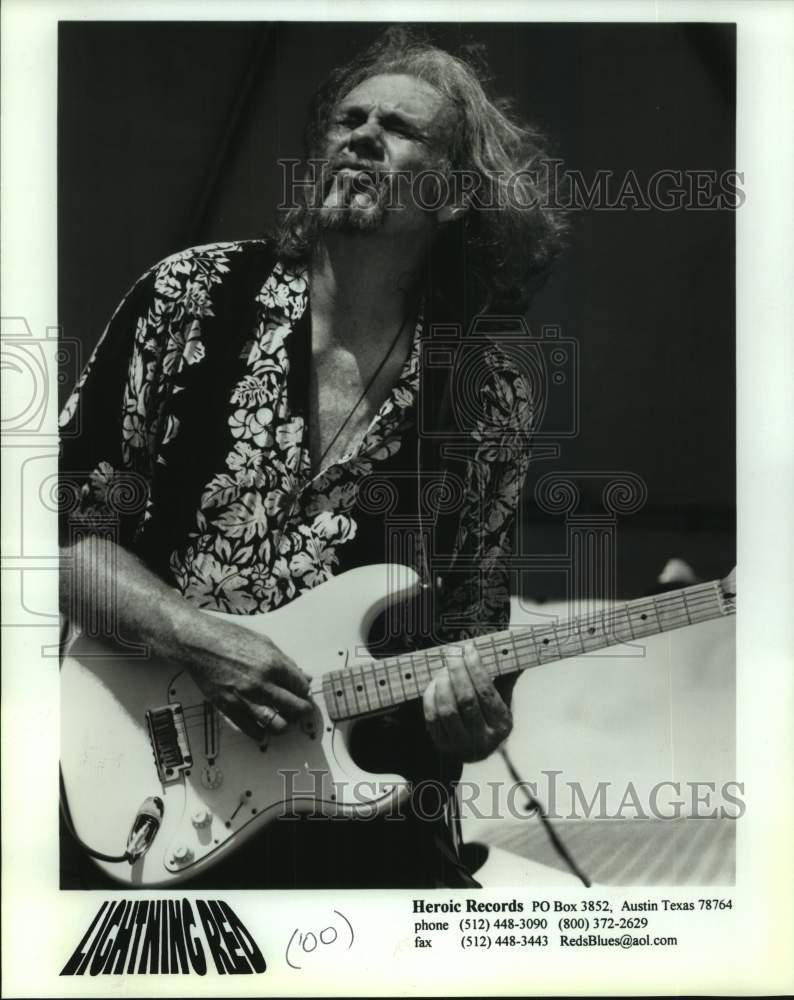 2000 Press Photo Lighting Red, Musician - sap20369- Historic Images