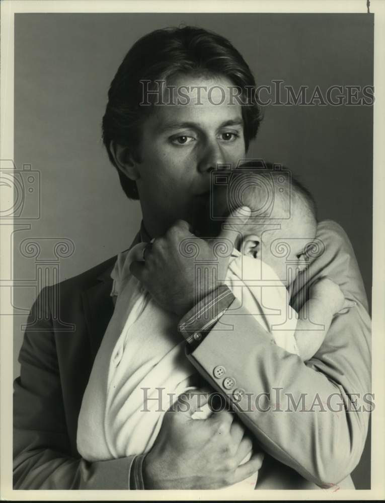 1989 Press Photo Actor Gary Cole with baby in &quot;Those She Left Behind&quot; on NBC-TV- Historic Images