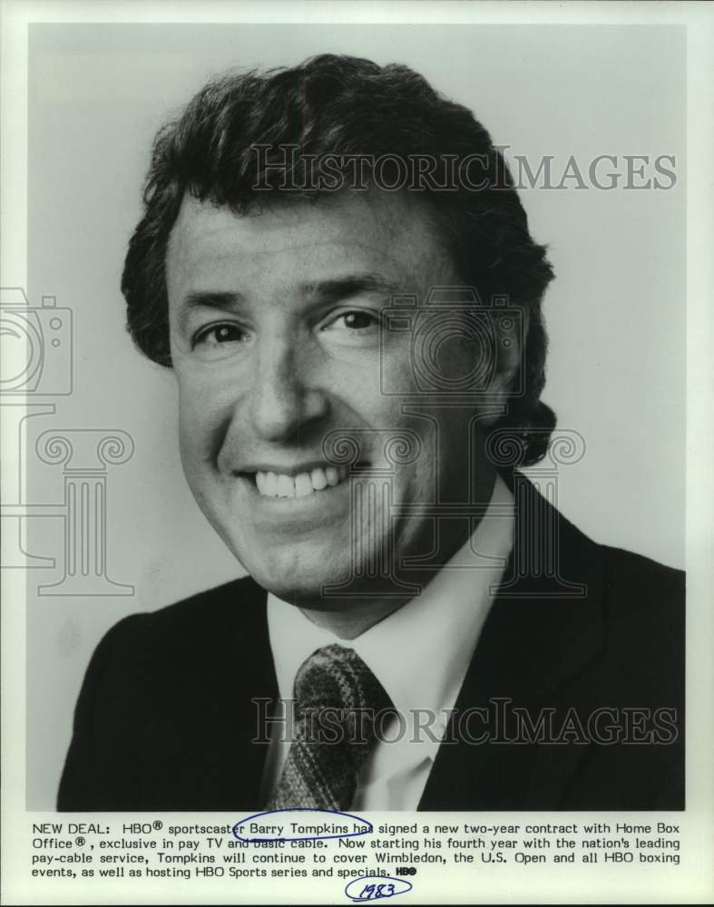 1983 Press Photo Sportscaster Barry Tompkins signs two-year contract with HBO.- Historic Images