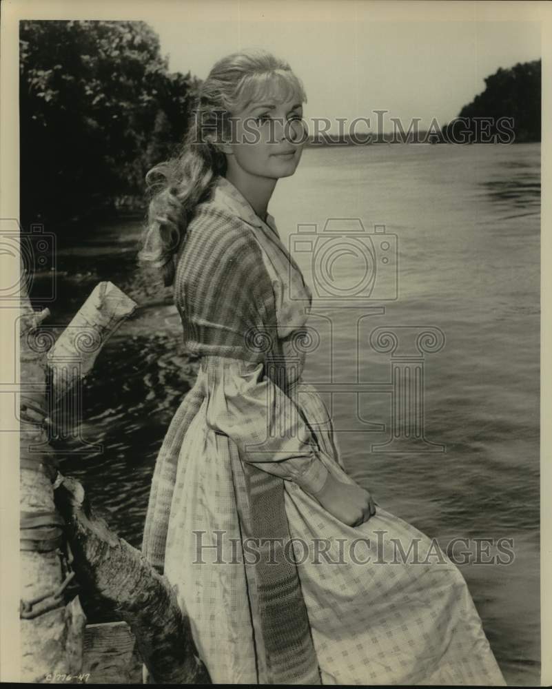 Press Photo Actress in Pioneer Dress Stands By River - sap52997- Historic Images