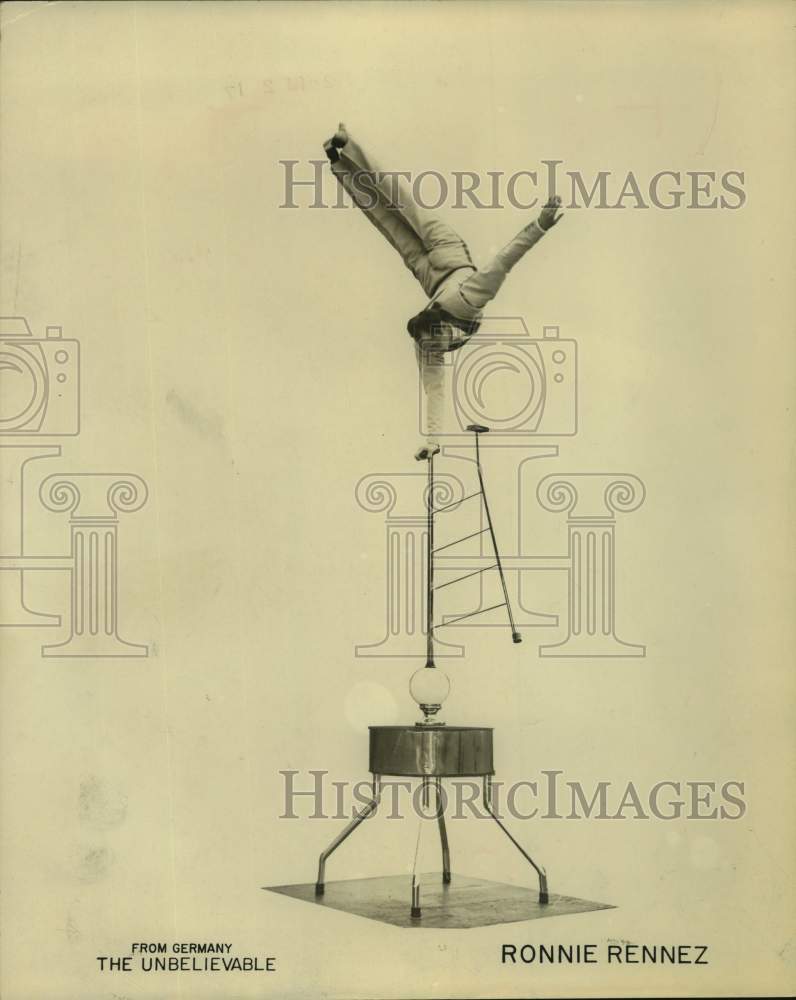 1965 Press Photo Balancing Act Artist Ronnie Rennez - sap54152- Historic Images