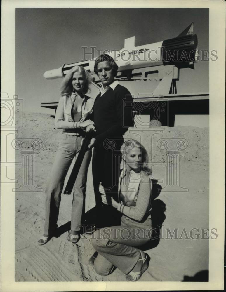 Press Photo Actor &amp; Two Actress Pose with Army Rocket - sap54654- Historic Images