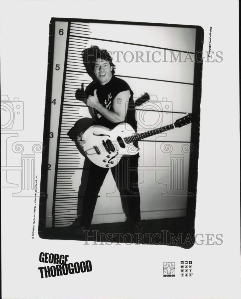 1988 Press Photo Musician George Thorogood Poses with Guitar - sap71102