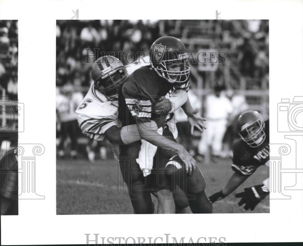 1991 Press Photo Carlos Rodriguez of Lanier tackles QB Joey Farias of McCollum- Historic Images