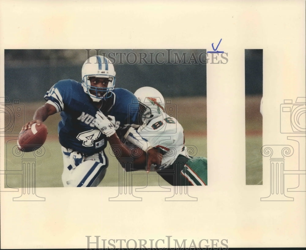 1991 Press Photo Jay quarterback Omar Jackson breaks away from Joseph Winters- Historic Images