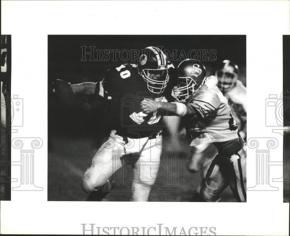 1990 Press Photo High school football action with Harlandale and Seguin- Historic Images