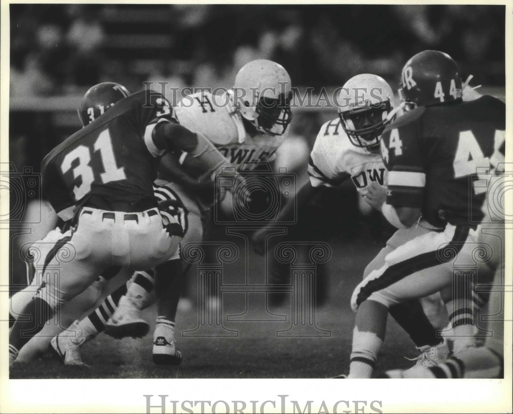 1986 Press Photo Highland and Roosevelt play a high school football game- Historic Images