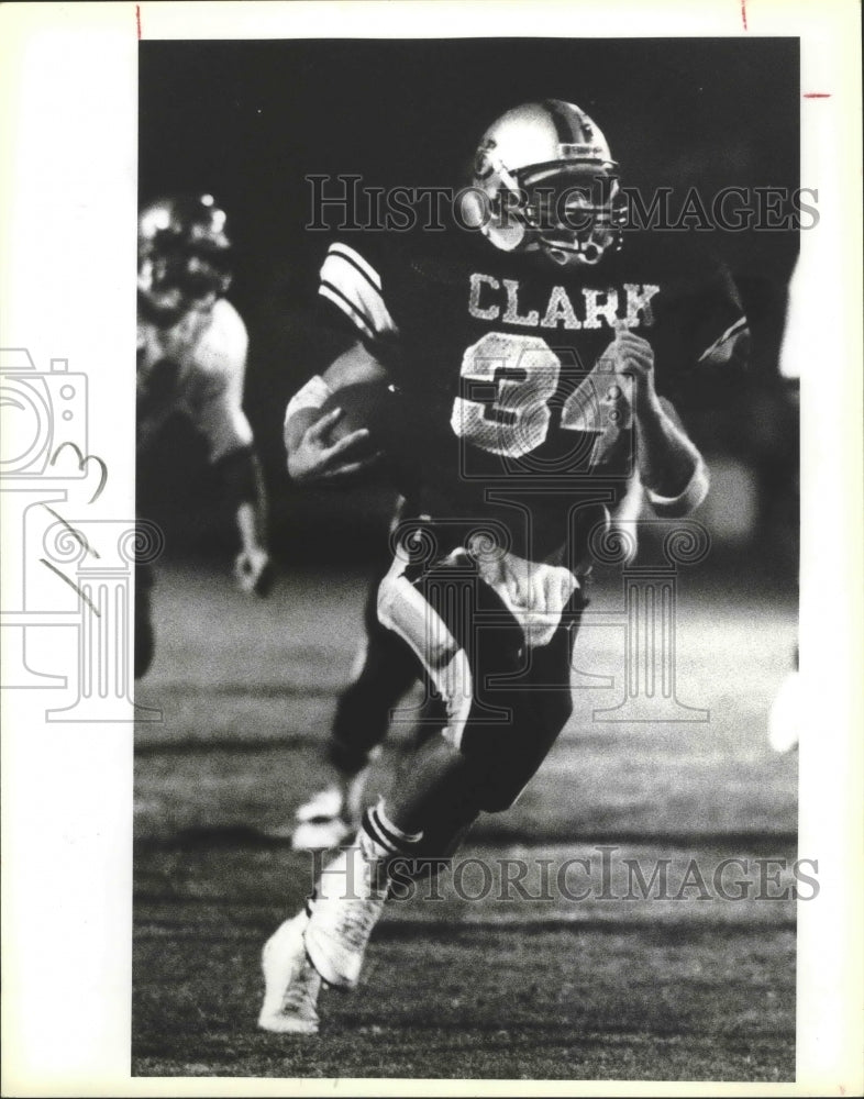 1986 Press Photo Clark and McCollum play a high school football game - sas01305- Historic Images