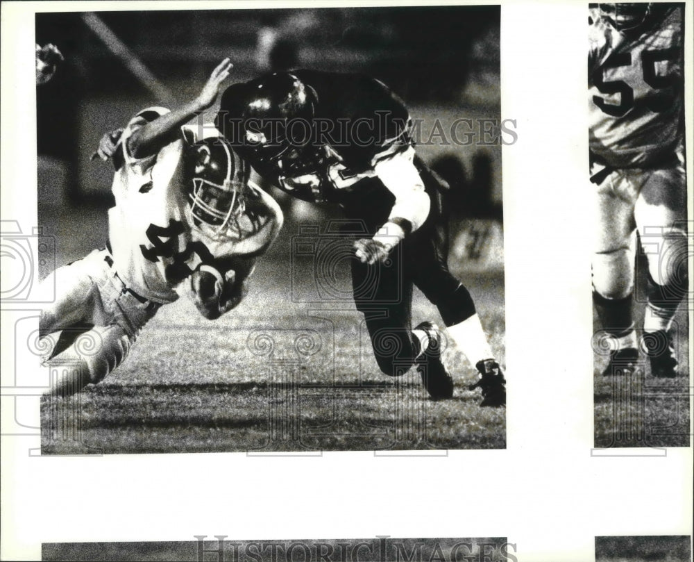 1993 Press Photo Gene Ramirez gets hit by Nathan Biediger, Matador Stadium- Historic Images