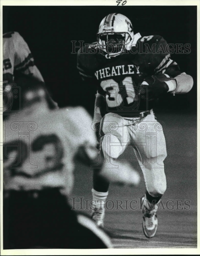 1987 Press Photo Rodney Wilson, Wheatley looks for room against Edison Football- Historic Images