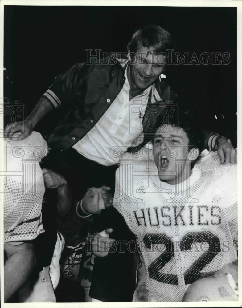 Press Photo Huskies Football Players Lift Coach in Celebration - sas03187- Historic Images