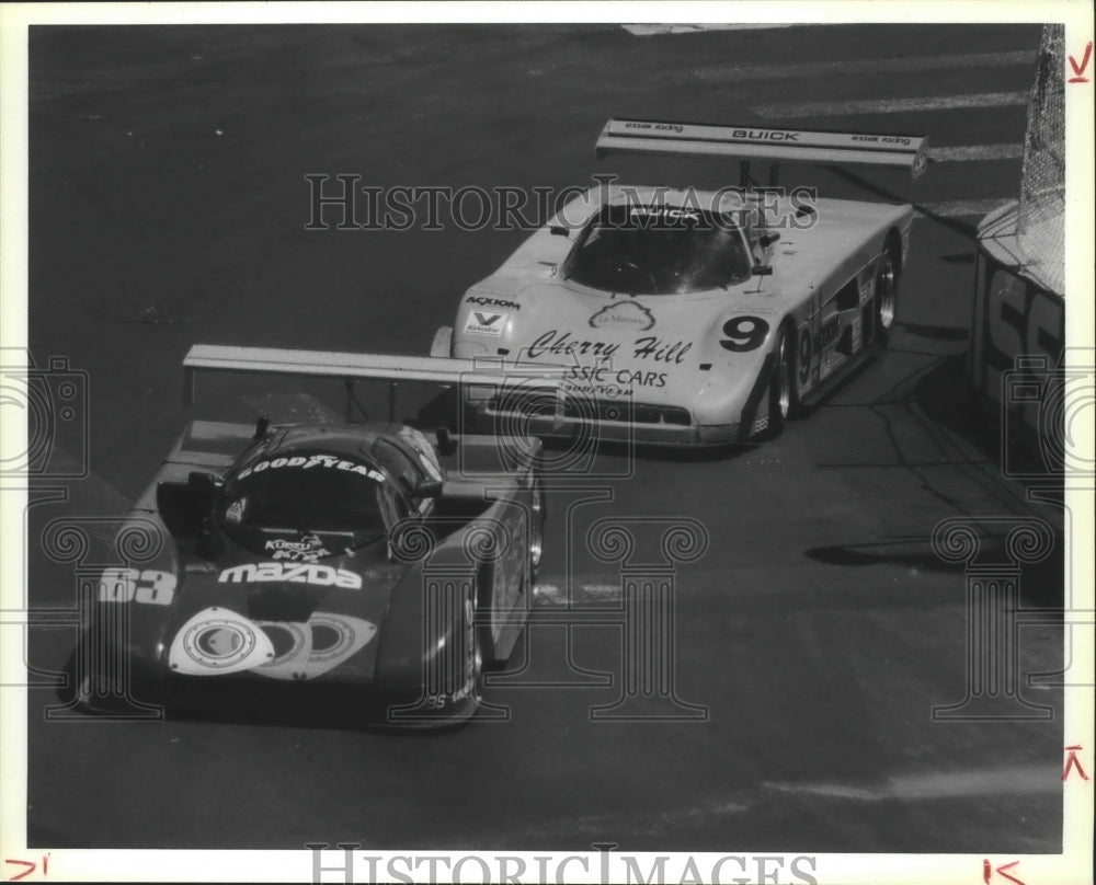1989 Press Photo Jim Downing & Howard Katz race in Camel Light Qualifying Race- Historic Images
