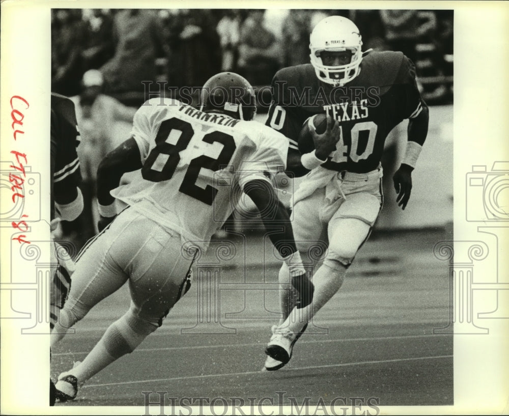 1984 Press Photo Luther Franklin defends Texas football player Kelvin Epps- Historic Images