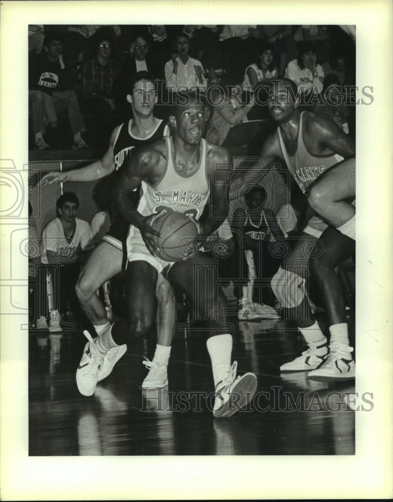 Press Photo Ervin Monier drives the baseline against Southwest, Basketball- Historic Images