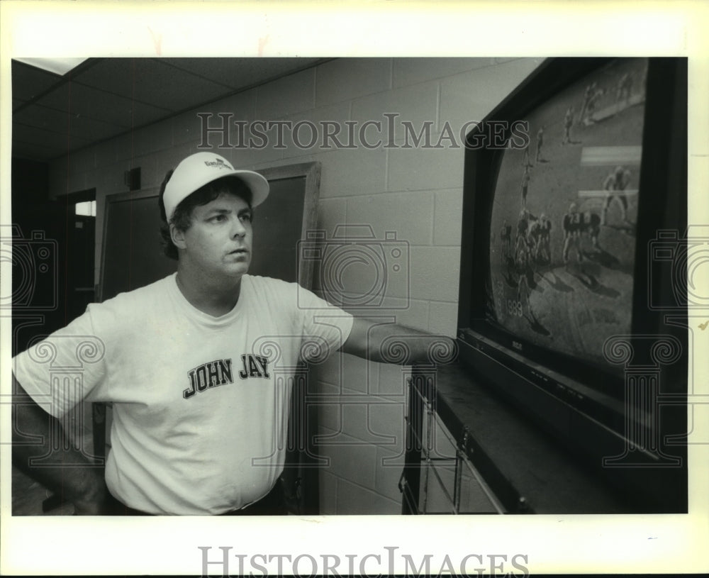 1989 Press Photo Rusty Dowling, John Jay Football Coach Watches Film - sas06770- Historic Images