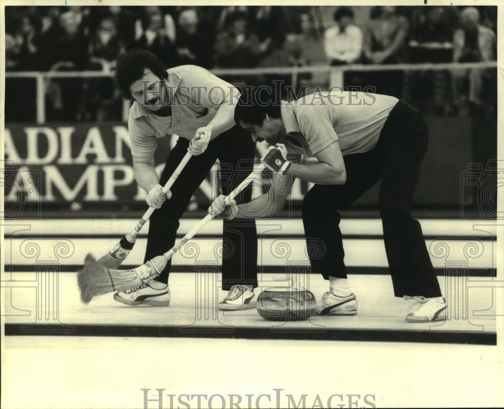 Press Photo Canadian Curling Competitors Hard Sweeping at Games - sas06937- Historic Images