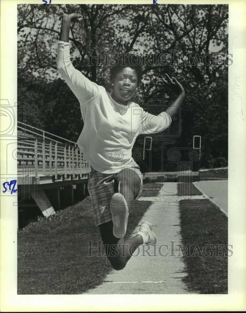 1989 Press Photo Portia Matthews, High School Track Long Jumper - sas07955- Historic Images