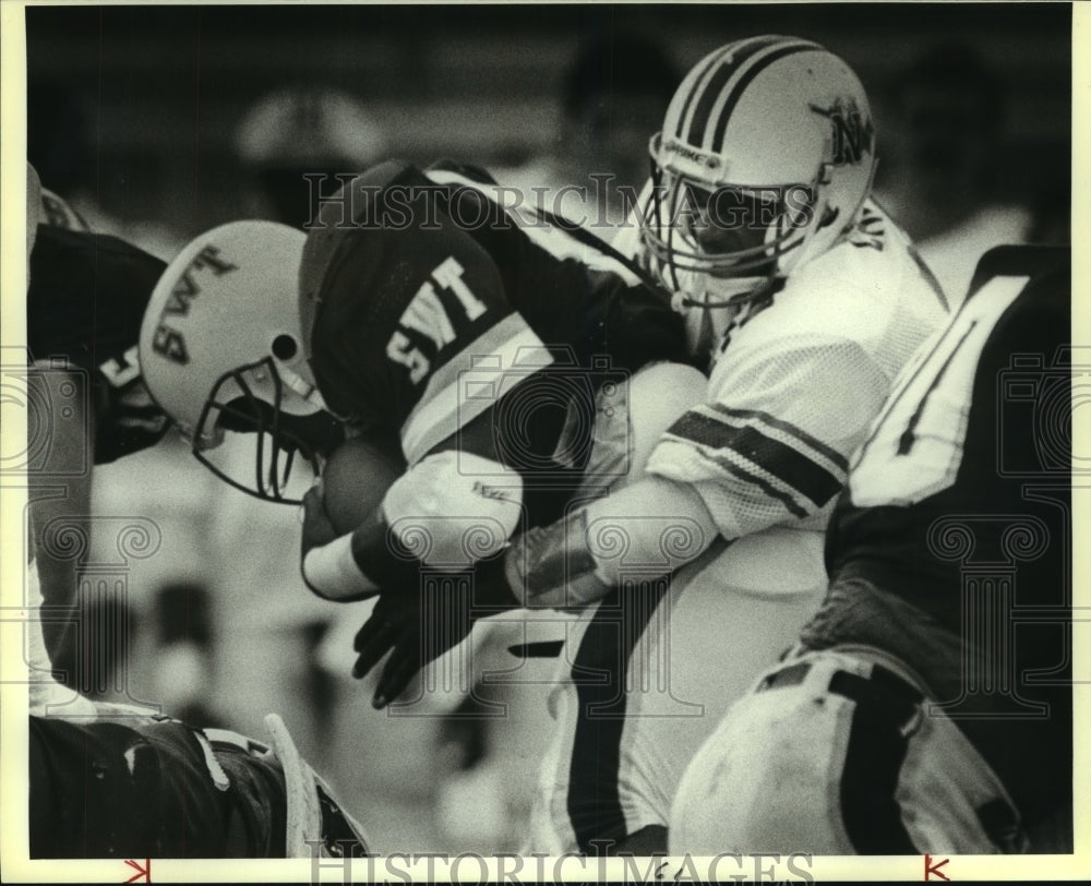 1987 Press Photo Northwest Lousiaia and Southwest Texas College Football Players- Historic Images