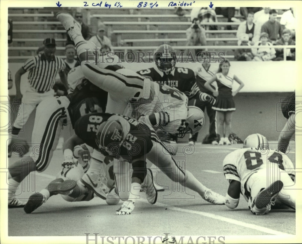 1987 Press Photo Texas Tech and Rice College Football Players at Game Tackle- Historic Images