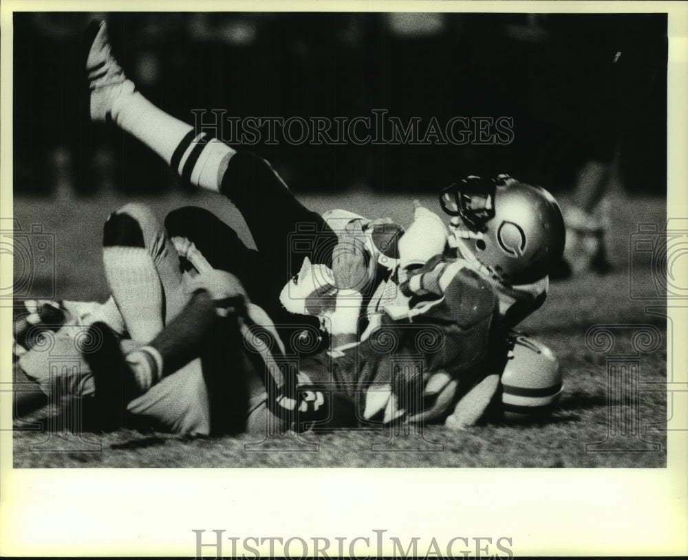 1983 Press Photo Clark and Judson High School Football Players at Game Tackle- Historic Images