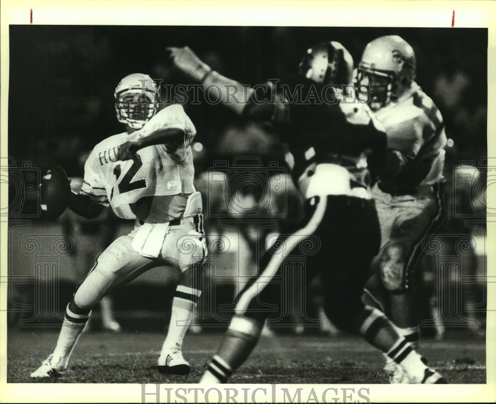 1984 Press Photo Holmes and Clark play a high school football game - sas08332- Historic Images