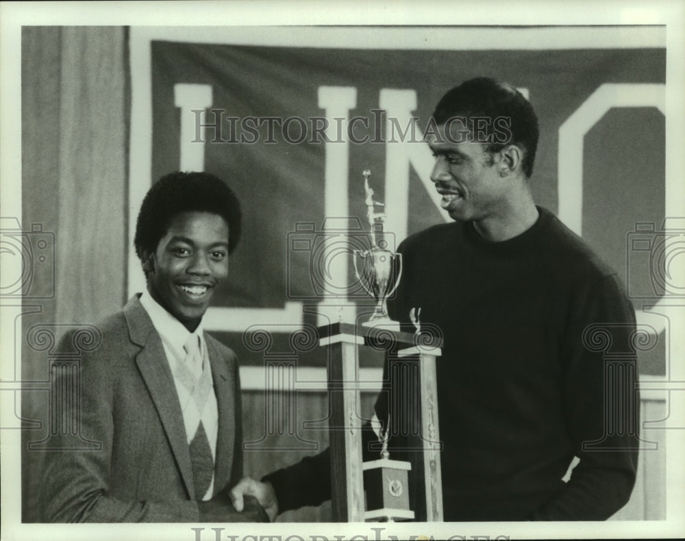 Press Photo Basketball Players with Trophy - sas08659- Historic Images