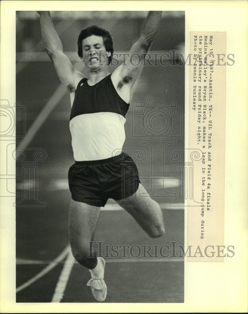 1987 Press Photo Bryan Black, Medina Valley High School Track Long Jumper- Historic Images