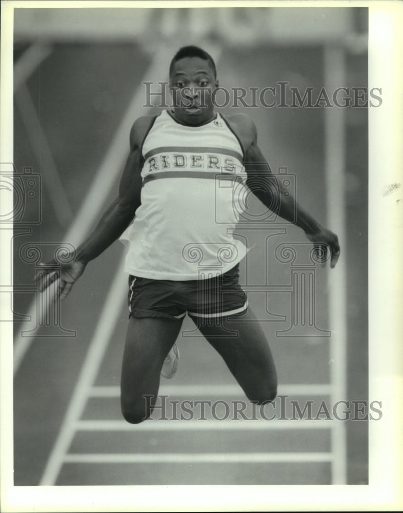 1991 Press Photo Michael Starks, Roosevelt High School Track Triple Jumper- Historic Images