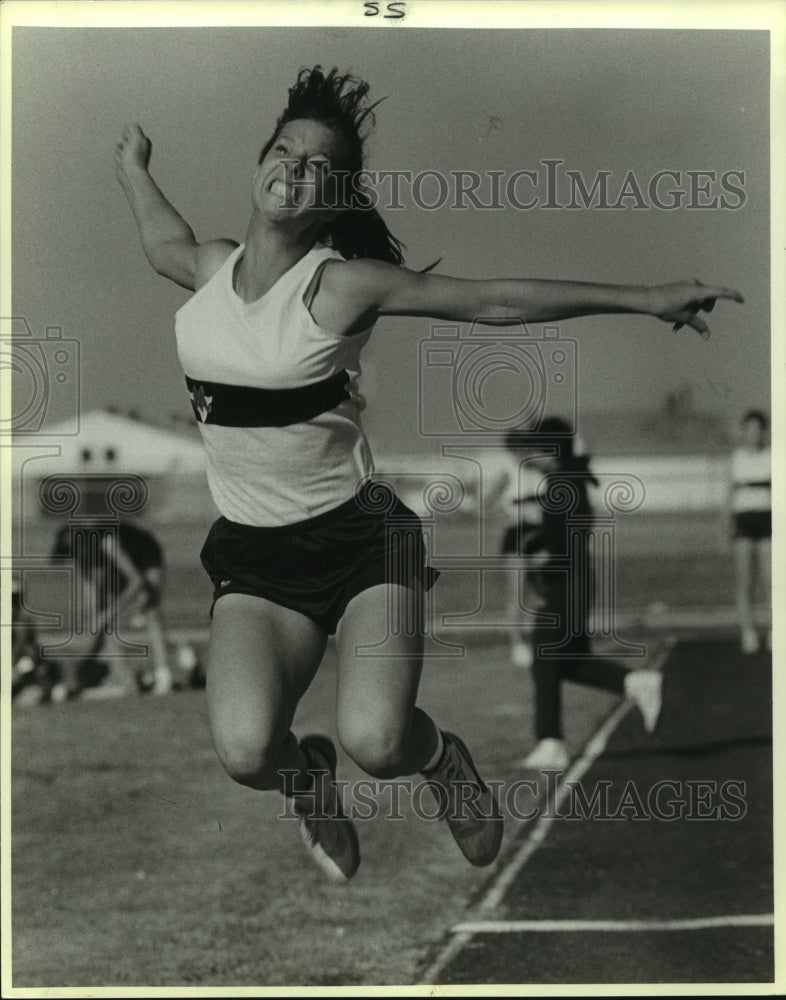 1987 Press Photo Jill Kempf, Medina Valley High School Track Long Jumper- Historic Images