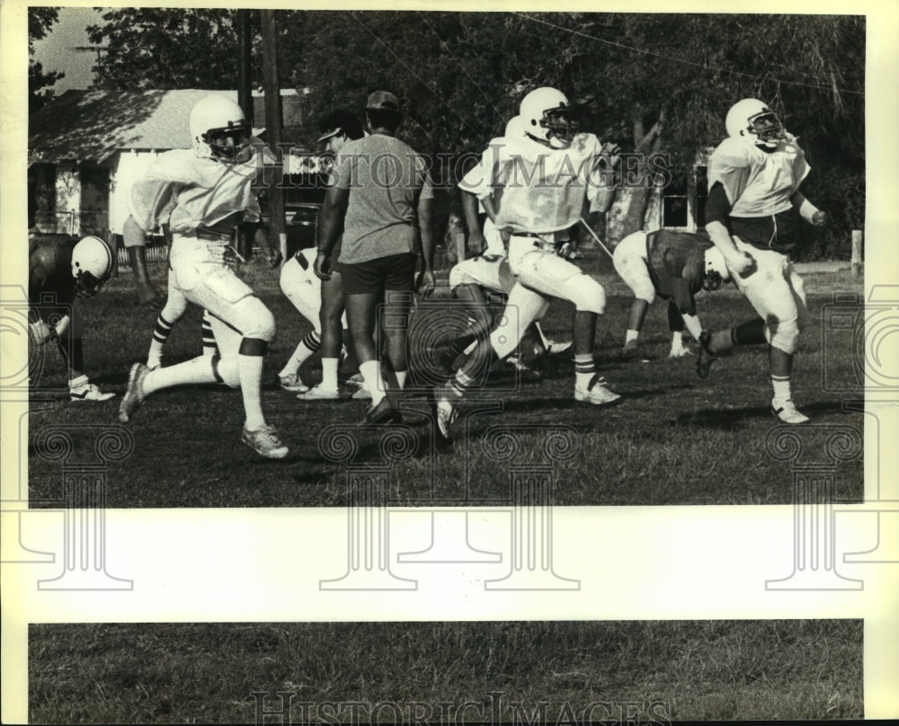 1984 Press Photo Memorial High School Football Players at Practice - sas09448- Historic Images