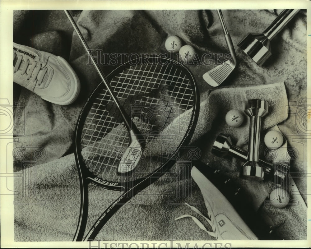 Press Photo A collection of golf, tennis and fitness gear - sas10405- Historic Images
