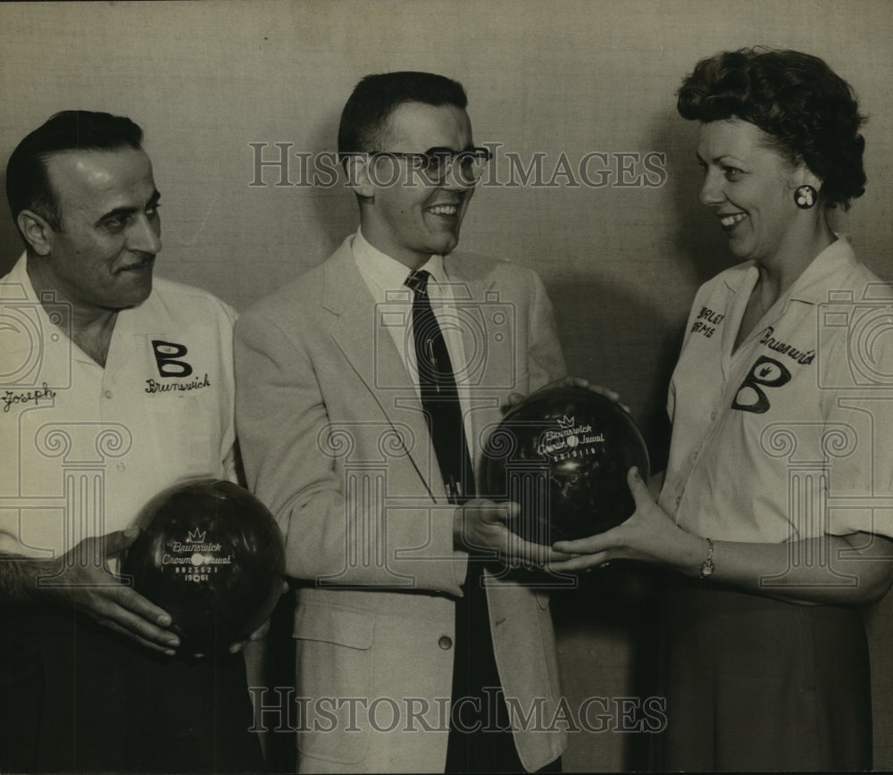 Press Photo Brunswick Bowling Officials with Bowling Balls - sas10468- Historic Images