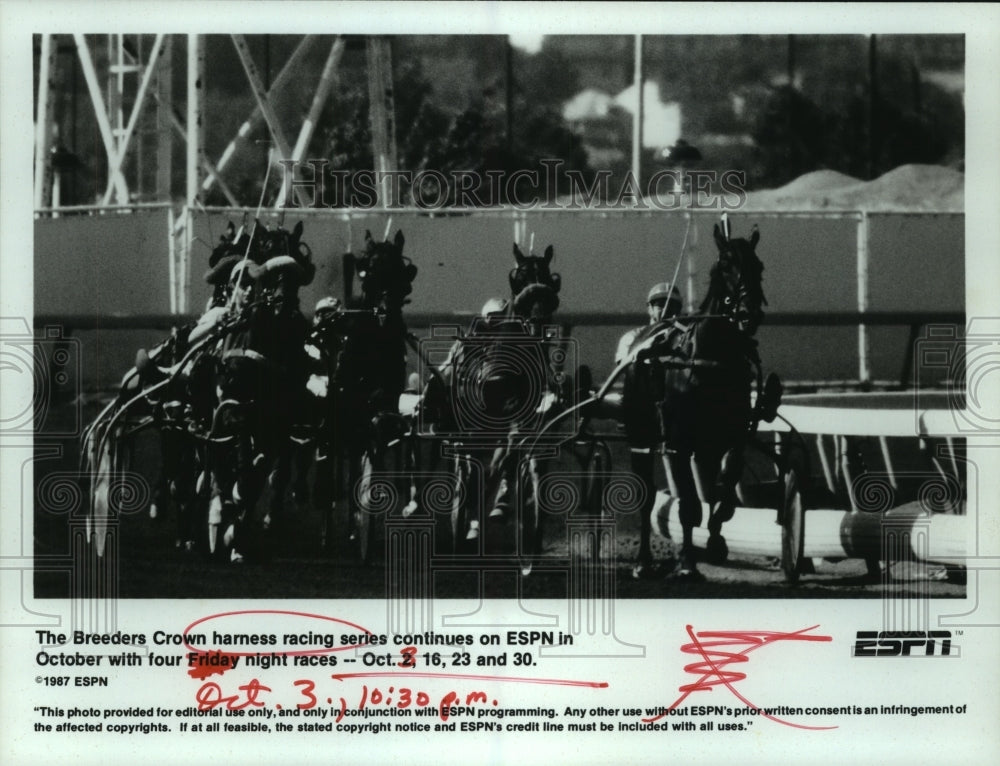 1987 Press Photo Race Horses and Riders at Breeders Crown Harness Racing Race- Historic Images