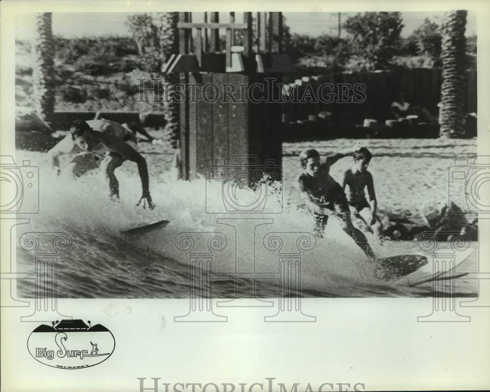 Press Photo Surfers ride waves in a wave pool - sas15596- Historic Images