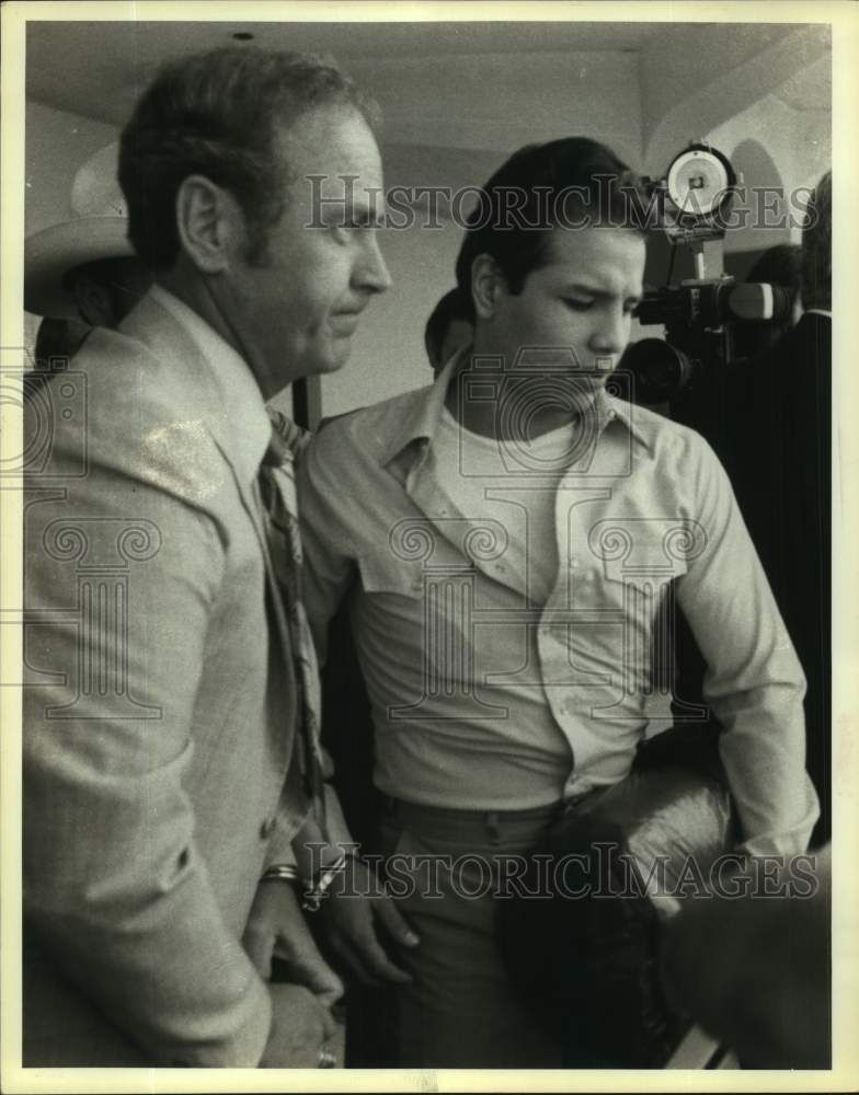 1983 Press Photo Boxer Tony Ayala Jr. in handcuffs at airport - sas17559- Historic Images