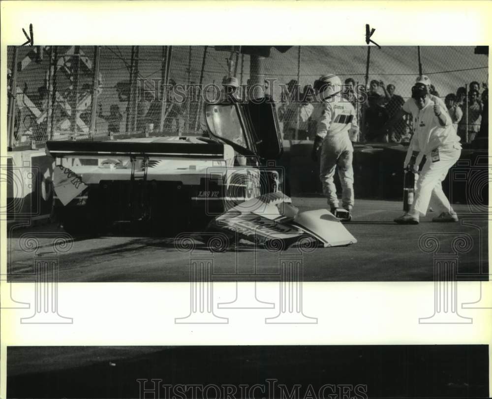 1988 Press Photo A wrecked Jaguar race car during the Nissan Grand Prix- Historic Images
