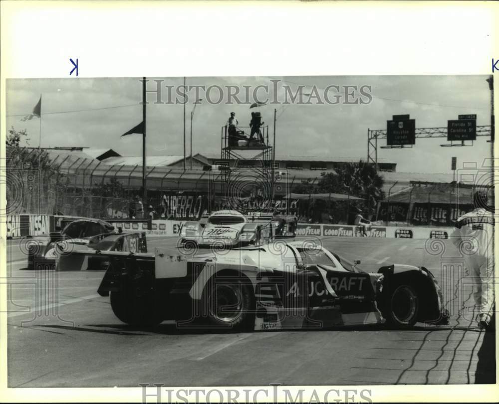 1989 Press Photo Driver Rene Herzog after crashing during Nissan Grand Prix- Historic Images