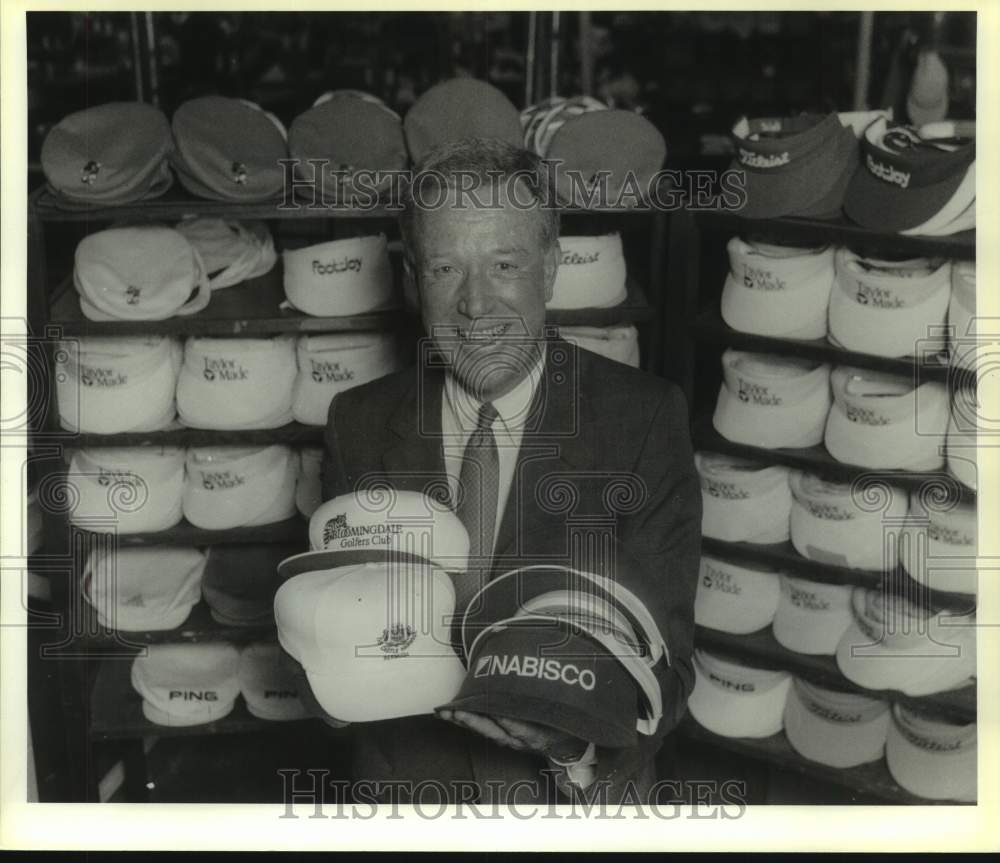 1989 Press Photo Bob Coleman of TEXACE with Company&#39;s Golf Hats - sas19052- Historic Images