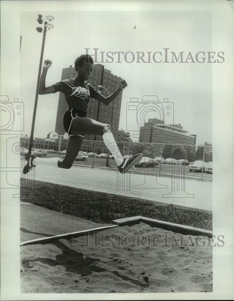 1977 Press Photo Girl Makes a Standing Long Jump at Track &amp; Field Youth Program- Historic Images