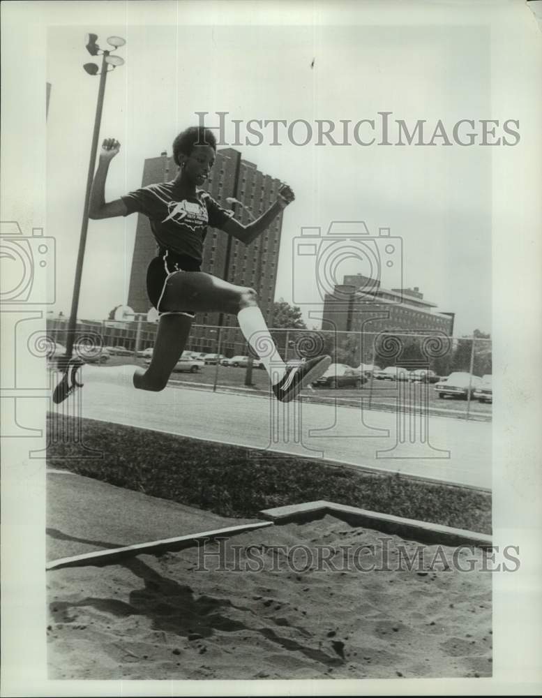 1977 Press Photo Girl Makes a Standing Long Jump at Track & Field Youth Program- Historic Images