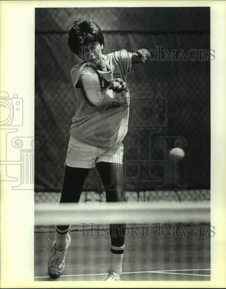 1986 Press Photo Tennis Player Giovanni Casanova Hits the Ball at Texas Games- Historic Images