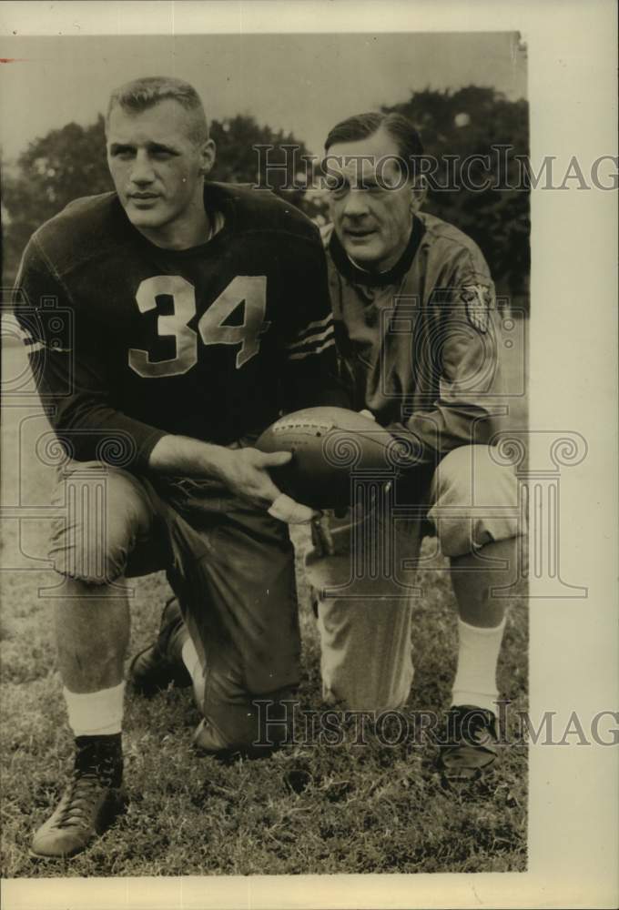 Press Photo Football Player Pat Uebel & Red Blair Kneeling with Ball - sas20784- Historic Images
