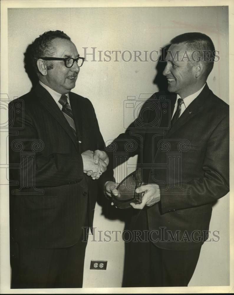 Press Photo R.R. Crick of Crick's Inc. Shakes Hands With Mr. Roppolo, Kerrville- Historic Images