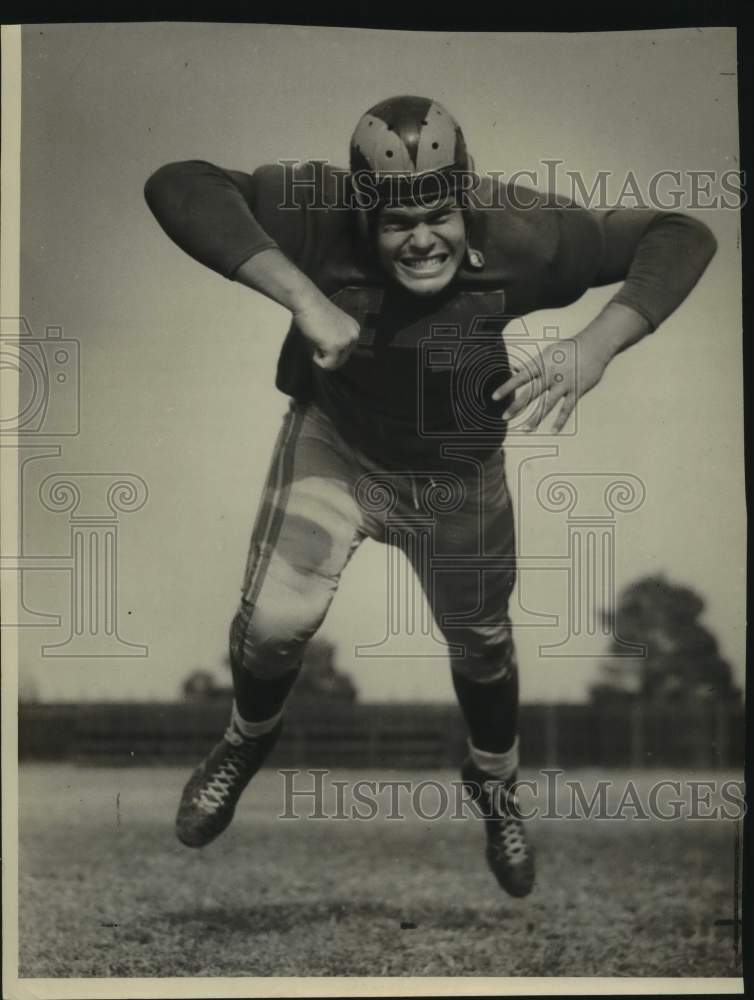 Press Photo Unidentified Football Player Lunges Forward - sas21306- Historic Images