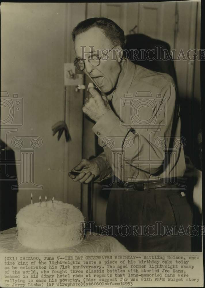 1953 Press Photo Former Boxer Battling Nelson Tastes Birthday Cake in Chicago- Historic Images