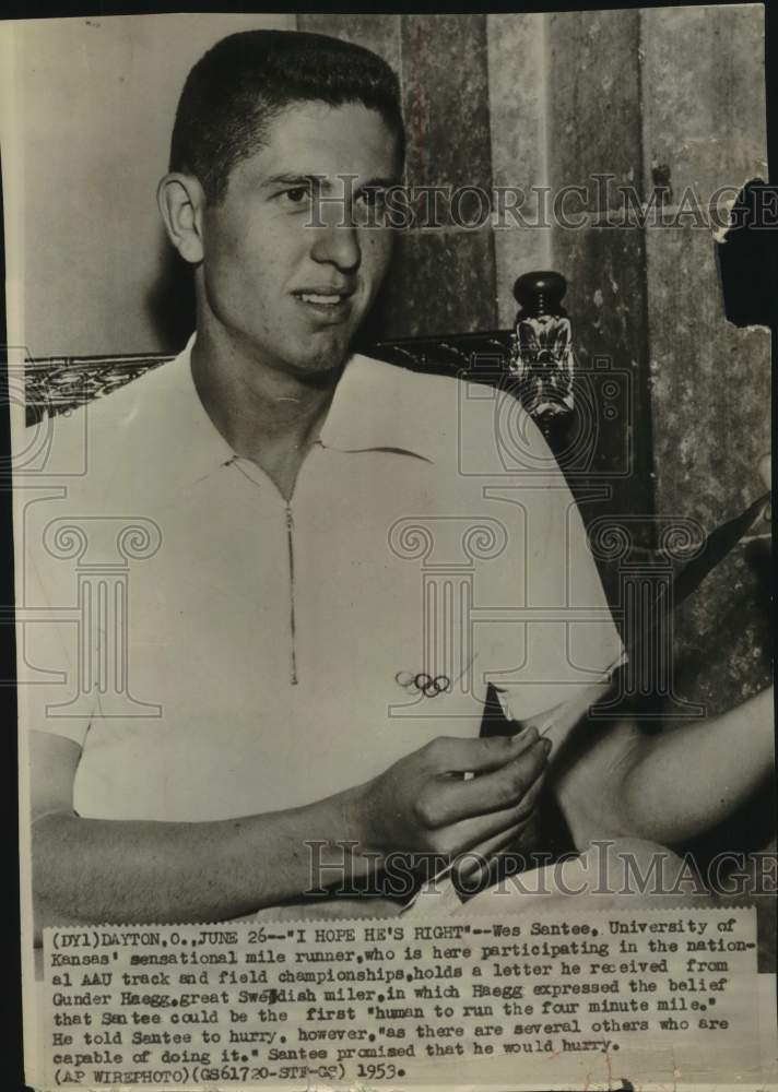 1953 Press Photo University of Kansas Runner Wes Santee Holds Letter, Dayton- Historic Images