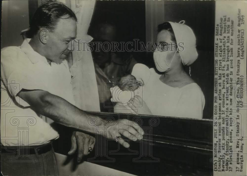 1949 Press Photo Boston Nurse Shows Braves Baseball Player Eddie Stanky Daughter- Historic Images