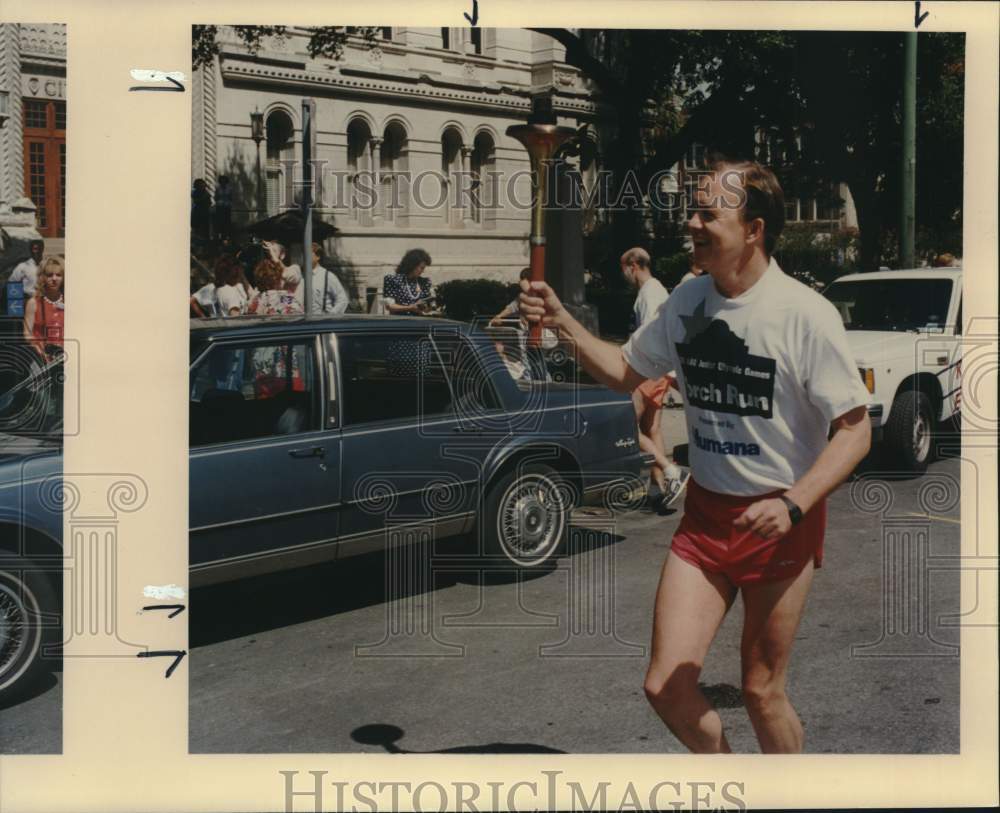 1983 Press Photo Joe Krier Leaves City Hall With AAU Junior Olympic Torch- Historic Images