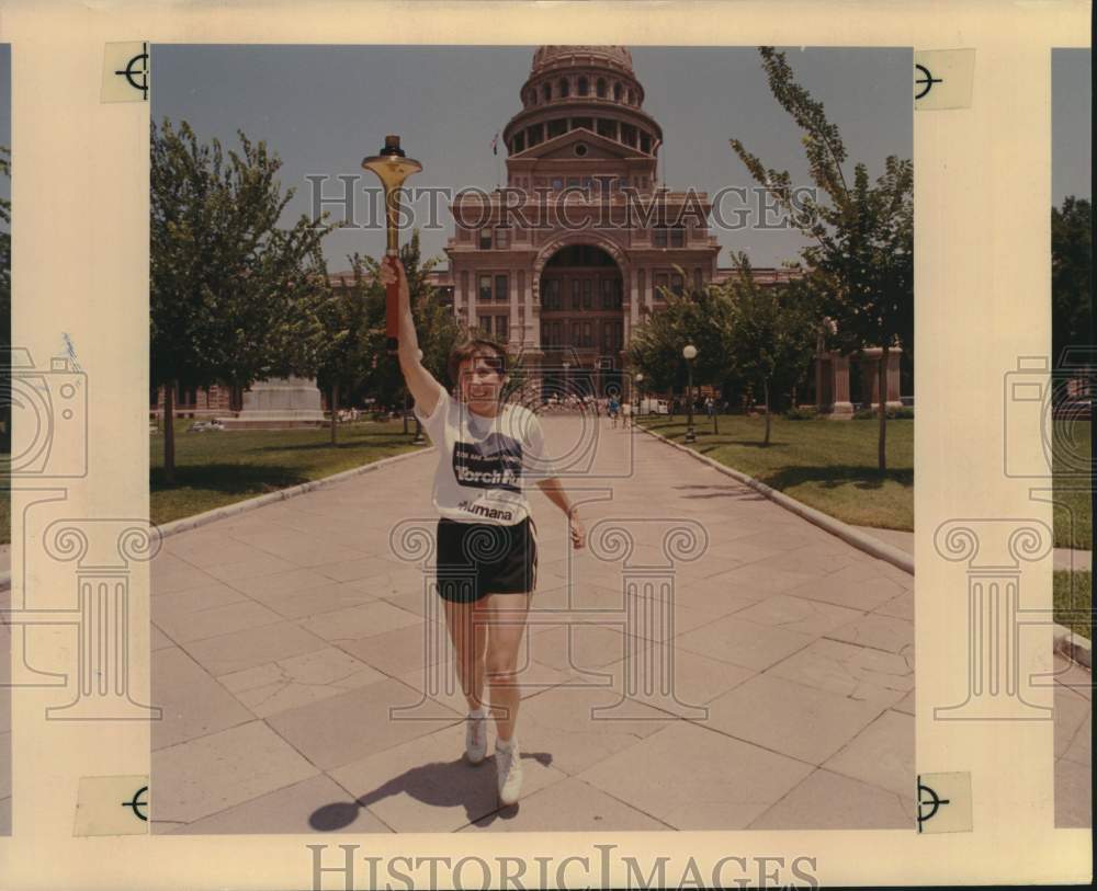 Press Photo State Senator Cyndi Krier Carries Junior Olympic Torch from Capitol- Historic Images